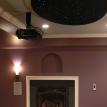 Numinous Star Panel Ceiling and Fireplace in Theater
